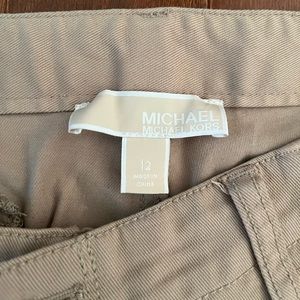 Michael Kors Skinny leg pants. Gold zipper accents. Size 12.